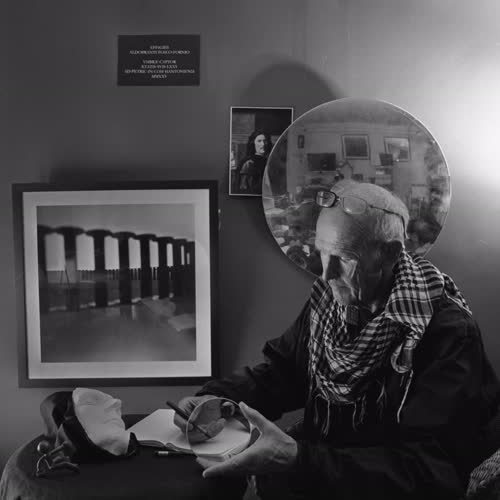 <body>
 <p>
  This series,<i> Self-portrait, after Poussin</i> explores how we see ourselves over time. The plaster mask is a self-portrait made years ago: it represents the past self, fixed and unchanging. The round glass lens stands for photography and the present moment, always shifting with light. The mirror shows that identity is never just individual but always in relation to others.
 </p>
 <p>
In the 1649 painting, Poussin included statuary and a ring referencing Stoic philosophy. Stoicism taught that life is shaped by time, change, and the need to accept what is beyond our control. Poussin used these icons to show himself not only as an artist, but also as someone seeking wisdom in a changing world.
 </p>
 <p>
In today’s age, these ideas still feel relevant. The plaster mask recalls memory and permanence, but the lens and mirror suggest the constant flux of the present and our ties to others. Like the Stoics, the project reflects on how we live with change and find steadiness in self-understanding. Philosopher Paul Ricoeur’s writings on identity deepen this reflection: we are at once the same person over time and always becoming someone new.
 </p>
</body>
 Images Copyright Aldobranti® ©2008-'2025. All rights reserved.